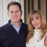 Michael and Susan Dell pose for photographs November 26, 2025, in New York. (AP Photo/Frank Franklin II)