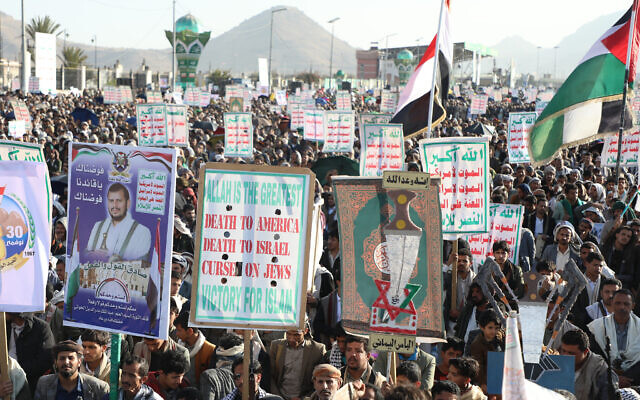 Supporters of the Houthi terror group gather as they celebrate independence day, marking the end of British rule in South Yemen in 1967, in Sanaa, Yemen, November 30, 2025. At front is a sign reading, "Death to America, death to Israel, curse on Jews." (AP/Osamah Abdulrahman) Supporters of the Houthi terror group gather as they celebrate independence day, marking the end of British rule in South Yemen in 1967, in Sanaa, Yemen, November 30, 2025. At front is a sign reading, "Death to America, death to Israel, curse on Jews." (AP/Osamah Abdulrahman)