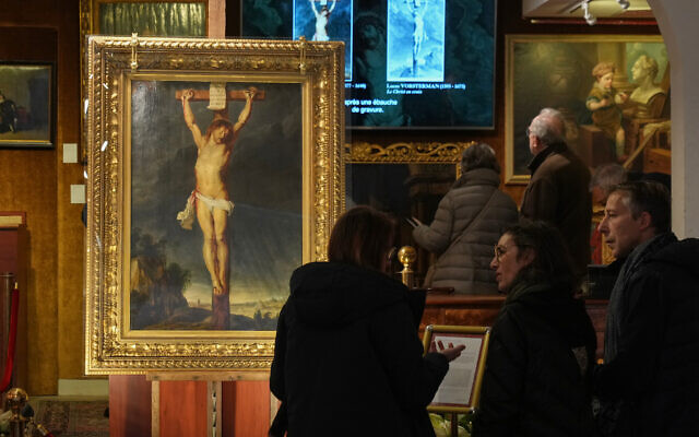 Long-lost painting 'Crucifixion of Jesus Christ' by Baroque master Peter Paul Rubens, which was hidden for more than four centuries, is displayed at the auction house Osenat in Versailles, west of Paris, Nov. 30, 2025. (AP Photo/Michel Euler) Long-lost painting 'Crucifixion of Jesus Christ' by Baroque master Peter Paul Rubens, which was hidden for more than four centuries, is displayed at the auction house Osenat in Versailles, west of Paris, Nov. 30, 2025. (AP Photo/Michel Euler)
