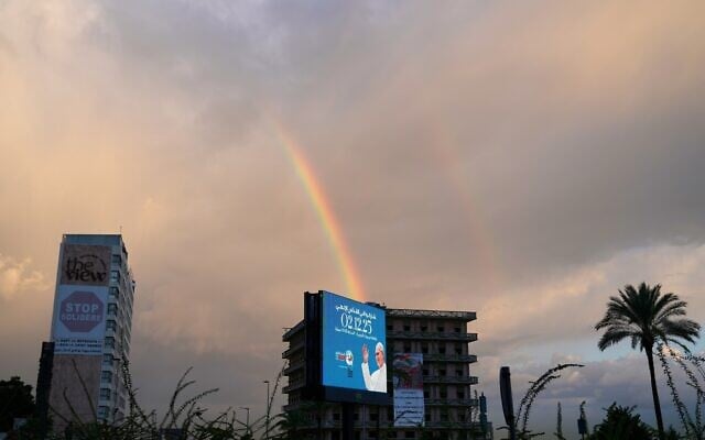 A rainbow rises behind a billboard featuring Pope Leo XIV in Beirut, Lebanon, Monday, December 1, 2025. (AP Photo/Hassan Ammar) A rainbow rises behind a billboard featuring Pope Leo XIV in Beirut, Lebanon, Monday, December 1, 2025. (AP Photo/Hassan Ammar)
