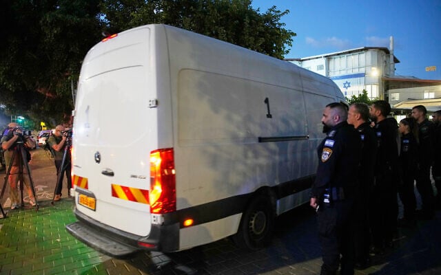 A vehicle carrying remains handed over by Hamas to Israel arrives at the Abu Kabir Forensic Institute in Tel Aviv, Dec. 2, 2025. (AP/Ohad Zwigenberg)