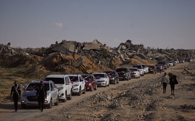 A convoy of Palestinian grooms travels to Hamad City in Khan Younis, in the Gaza Strip, to take part in a mass wedding ceremony Tuesday, Dec. 2, 2025. (AP Photo/Abdel Kareem Hana)