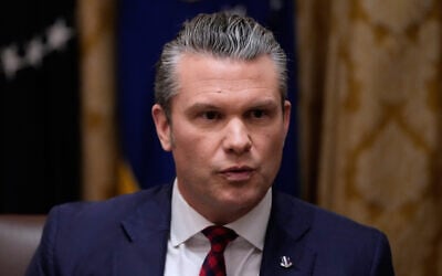 US Defense Secretary Pete Hegseth speaks during a Cabinet meeting at the White House, December 2, 2025, in Washington. (AP Photo/Julia Demaree Nikhinson)