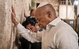 New York City Mayor Eric Adams praying at the Western Wall, in Jerusalem, November 16, 2025. (Benny Polatseck/Mayoral Photography Office via AP)