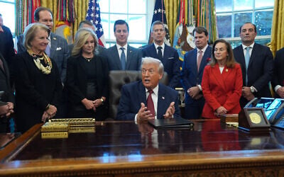 US President Donald Trump speaks during an event on fuel economy standards in the Oval Office of the White House, December 3, 2025, in Washington. (AP Photo/Evan Vucci)