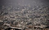 Buildings destroyed in the war between Israel and Hamas lie in ruins around the Shejaiya neighborhood of Gaza City, during an IDF-organized tour for journalists, November 5, 2025. (Ohad Zwigenberg/AP)