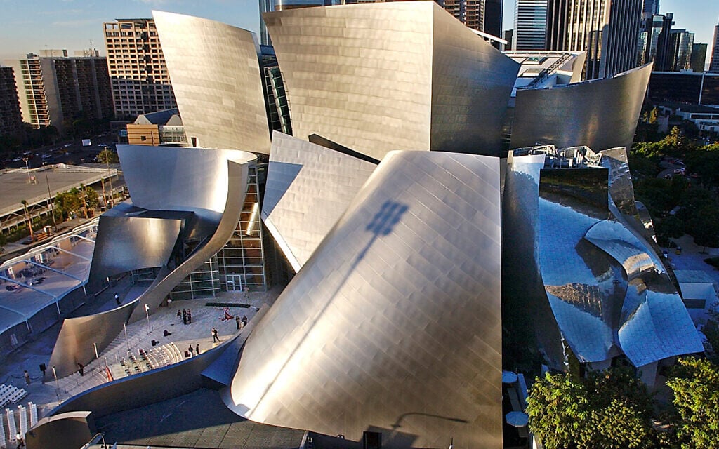 FILE - This file photo from October 20, 2003, shows early morning sun illuminating the new Walt Disney Concert Hall in downtown Los Angeles.  (AP Photo/Nick Ut, file)