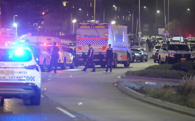 Police cordon off an area at Bondi Beach after a deadly terror shooting targeting a Jewish event in Sydney, December 14, 2025. (AP/Mark Baker)