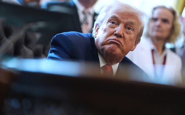 US President Donald Trump speaks to reporters after signing an executive order reclassifying marijuana as a less dangerous drug in the Oval Office of the White House, December 18, 2025, in Washington. (AP Photo/Evan Vucci) US President Donald Trump speaks to reporters after signing an executive order reclassifying marijuana as a less dangerous drug in the Oval Office of the White House, December 18, 2025, in Washington. (AP Photo/Evan Vucci)