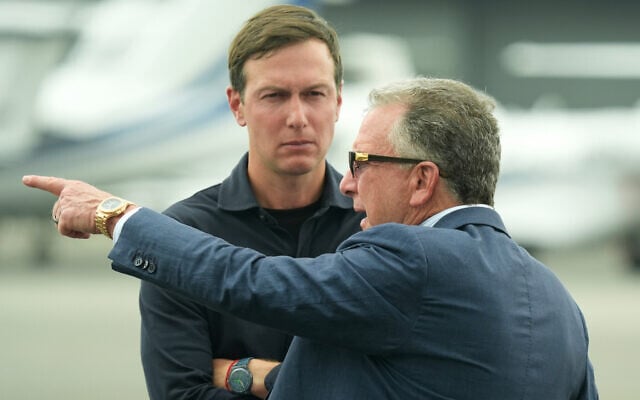 White House special envoy Steve Witkoff (right) and Jared Kushner wait for the arrival of US President Donald Trump at Teterboro Airport in Teterboro, New Jersey, en route to attend the Club World Cup final soccer match, July 13, 2025. (AP/Jacquelyn Martin, File)