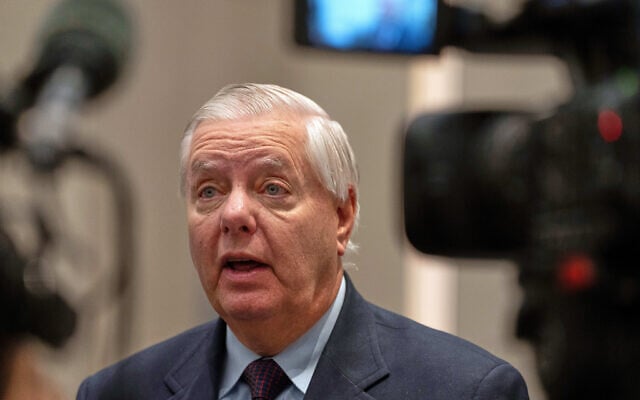 Republican US Senator Lindsey Graham of South Carolina speaks to the media in Tel Aviv, Israel, December 21, 2025. (AP/Maya Levin)
