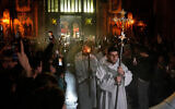 People attend a Catholic Christmas Eve mass in St. Antoine Church, in Istanbul, Turkey, December 24, 2025. (AP/Khalil Hamra)