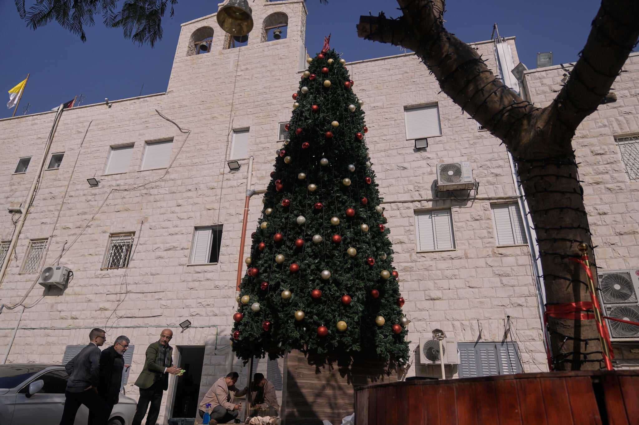 3 Palestinians arrested over torching of Christmas tree at West Bank Catholic church
