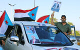 Supporters of the Southern Transitional Council (STC), a coalition of separatist groups seeking to restore the state of South Yemen, hold South Yemen flags and a poster of their leader, Aidarous al-Zubaidi during a rally, in Aden, Yemen, December 25, 2025. (AP)