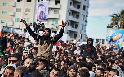Protesters from the Alawite religious minority demonstrate in in Latakia, Syria, two days after a bomb in an Alawite mosque in Homs killed eight people, December 28, 2025. (AP/Omar Albam)