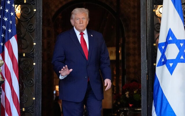 US President Donald Trump waves before he greets Prime Minister Benjamin Netanyahu at his Mar-a-Lago club, December 29, 2025, in Palm Beach, Florida. (AP Photo/Alex Brandon) US President Donald Trump waves before he greets Prime Minister Benjamin Netanyahu at his Mar-a-Lago club, December 29, 2025, in Palm Beach, Florida. (AP Photo/Alex Brandon)