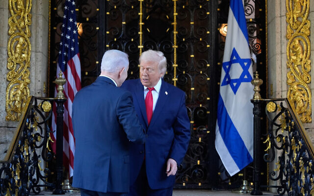 US President Donald Trump greets Prime Minister Benjamin Netanyahu at his Mar-a-Lago club, December 29, 2025, in Palm Beach, Florida. (AP Photo/Alex Brandon) US President Donald Trump greets Prime Minister Benjamin Netanyahu at his Mar-a-Lago club, December 29, 2025, in Palm Beach, Florida. (AP Photo/Alex Brandon)