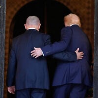 US President Donald Trump (right) and Prime Minister Benjamin Netanyahu walk into Trump's Mar-a-Lago club, December 29, 2025, in Palm Beach, Florida. (AP/Alex Brandon)