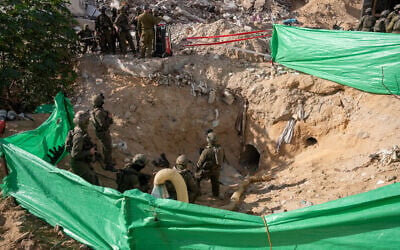 IDF soldiers stand near the entrance to a tunnel in the Rafah area of the southern Gaza Strip, where the body of Lt. Hadar Goldin was held, December 8, 2025. (Emanuel Fabian/Times of Israel)