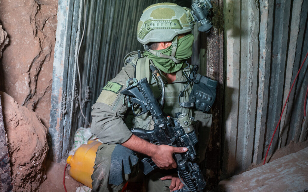 An officer with the elite Yahalom unit is seen inside a tunnel in the Rafah area of the southern Gaza Strip, where the body of Lt. Hadar Goldin was held, December 8, 2025. (Emanuel Fabian/Times of Israel)