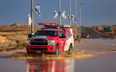FILE: Authorities block Route90 in the Negev Desert, after it was flooded due to heavy rains, May 4, 2025. (David Cohen/Flash90)