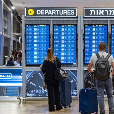 Travelers at Ben Gurion International Airport, October 23, 2025. (Nati Shohat/Flash90)