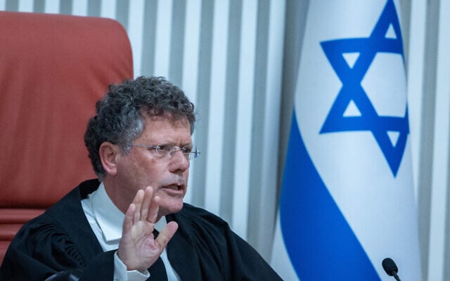 Supreme Court President Isaac Amit presides over a hearing on petitions against the appointment of David Zini as head of the Shin Bet, November 18, 2025. (Yonatan Sindel/Flash90) Supreme Court President Isaac Amit presides over a hearing on petitions against the appointment of David Zini as head of the Shin Bet, November 18, 2025. (Yonatan Sindel/Flash90)