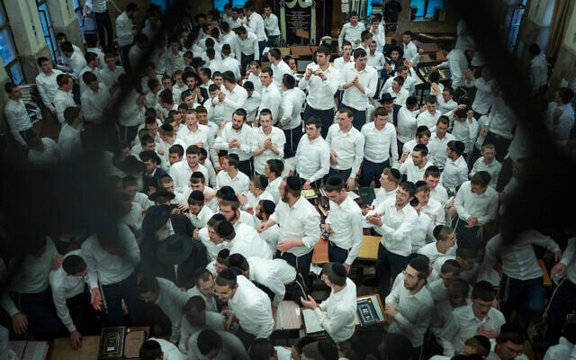 Ultra-Orthodox Jews from the Ponevezh Yeshiva gather in a study hall in Bnei Brak, November 19, 2025. (Erik Marmor/Flash90)