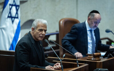 MK Yair Lapid attends a plenum session at the assembly hall of the Knesset, the Israeli parliament in Jerusalem, November 26, 2025. (Yonatan Sindel/Flash90)