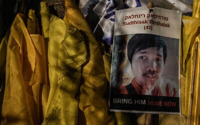 A poster of Sudthisak Rinthalak, whose body is still held in Gaza, November 29, 2025 (Tsafrir Abayov/Flash90)