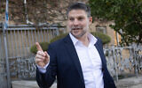 Finance Minister Bezalel Smotrich, seen after a press conference in Jerusalem, December 4, 2025. (Yonatan Sindel/Flash90)