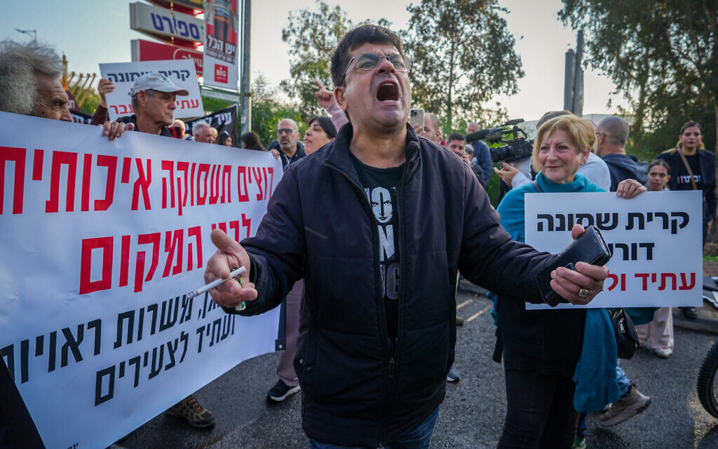 Residents of Kiryat Shmona and local business owners block the entrance to the city during a protest demanding financial assistance from the state, in Kiryat Shmona, December 16, 2025. (Ayal Margolin/Flash90)