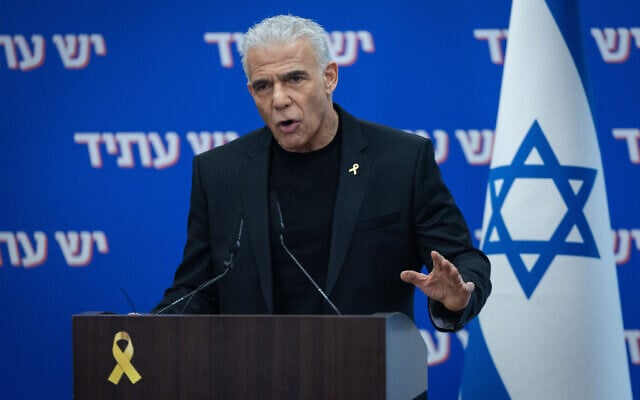 Opposition Leader MK Yair Lapid leads a faction meeting at the Knesset on December 22, 2025. (Yonatan Sindel/Flash90)