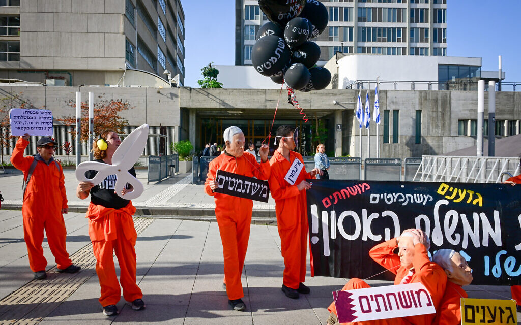 Activists protest against Prime Minister Benjamin Netanyahu outside the District Court in Tel Aviv, where Netanyahu was to testify in his trial, December 23, 2025. (Avshalom Sassoni/Flash90) Activists protest against Prime Minister Benjamin Netanyahu outside the District Court in Tel Aviv, where Netanyahu was to testify in his trial, December 23, 2025. (Avshalom Sassoni/Flash90)