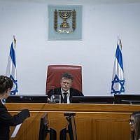Supreme Court President Isaac Amit arrives for a hearing at the High Court of Justice in Jerusalem, December 23, 2025. (Chaim Goldberg/Flash90)