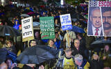 People attend a protest against Prime Minister Benjamin Netanyahu and his government at Habima Square in Tel Aviv, December 27, 2025. (Avshalom Sassoni/Flash90)