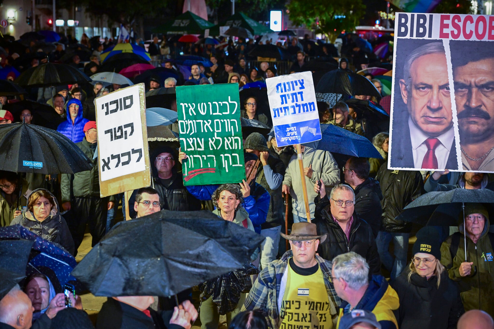 Former police chief slams Netanyahu at rainy anti-government protest in Tel Aviv Curated by Alerts360