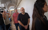 Former police investigator Tzachi Havkin arrives for a court hearing at the Jerusalem Magistrate’s Court, September 10, 2025, in a photo cleared for publication on December 28, 2025. (Yonatan Sindel/Flash90)