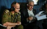 Prime Minister Benjamin Netanyahu (right) and his military secretary, Maj. Gen. Roman Gofman, seen in a helicopter on June 30, 2024. (Maayan Toaf/GPO)