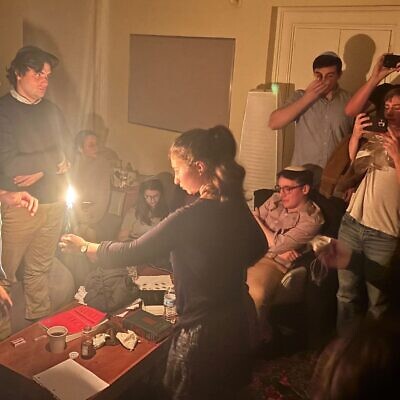Jewish students mark havdalah during a lockdown caused by a shooting in an engineering class at Brown University, Rhode Island, December 13, 2025. (Courtesy Josh Bolton via JTA)