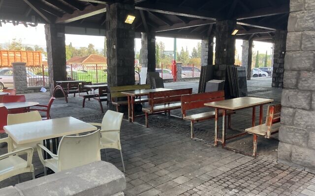 Empty tables along Kiryat Shmona's main street, once a bustling area, on December 16, 2025. (Diana Bletter/Times of Israel) Empty tables along Kiryat Shmona's main street, once a bustling area, on December 16, 2025. (Diana Bletter/Times of Israel)