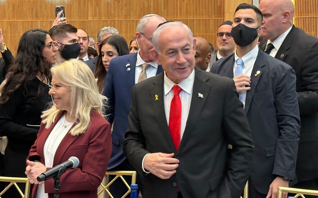 Prime Minister Benjamin Netanyahu and his wife Sara arrive at a lunch meeting with elected officials and Jewish communal leaders at The Shul of Bal Harbour, Florida, on December 31, 2025. (Lazar Berman/The Times of Israel)