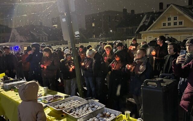 Students participate in a Hanukkah candle lighting at Brown University, Rhode Island, December 14, 2025. (Shira Li Bartov/JTA)
