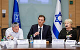 Knesset Foreign Affairs and Defense Committee chairman Boaz Bismuth (center) and committee legal adviser Miri Frenkel Shor (right) during a discussion of the government's proposed law to regulate ultra-Orthodox conscription and exemptions, December 28, 2025. (Noam Moskowitz/Office of the Knesset Spokesperson)