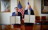 Knesset Speaker Amir Ohana (right) and US House Speaker Mike Johnson pose for a photograph following a meeting in Washington, DC, on December 9, 2025. (Noam Moskowitz/Knesset Spokesperson)
