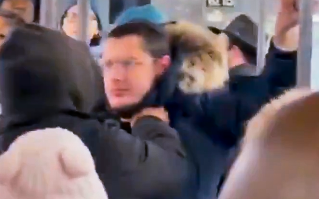 An Orthodox Jewish man is assaulted on a New York City subway train, on December 15, 2025. (Screenshot via X, used in accordance with Clause 27a of the Copyright Law) An Orthodox Jewish man is assaulted on a New York City subway train, on December 15, 2025. (Screenshot via X, used in accordance with Clause 27a of the Copyright Law)