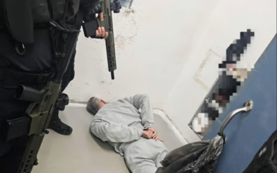 This photo sent out by an Israel Prison Service spokesperson shows terror convict Mahmoud Atallah laying on the ground after guards stormed his prison cell on December 26, 2025. (Courtesy)