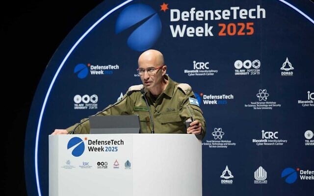 Brig. Gen. Benny Aminov, head of the Defense Ministry Directorate of Defense Research & Development's Military R&D Unit, speaks at the DefenseTech Summit at Tel Aviv University, December 1, 2025. (Defense Ministry)