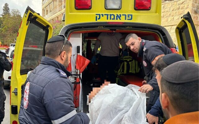 Paramedics transport an injured man to Shaare Zedek Hospital after he was attacked in Jerusalem on December 9, 2025. (Magen David Adom) Paramedics transport an injured man to Shaare Zedek Hospital after he was attacked in Jerusalem on December 9, 2025. (Magen David Adom)