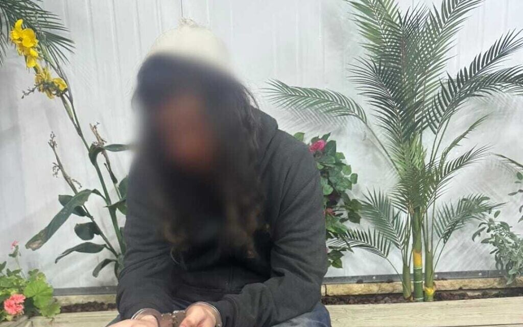 A 17-year-old suspected of taking part in a large-scale arson attack against Palestinians in the northern West Bank in November 2025, after being arrested on December 18. (Israel Police)